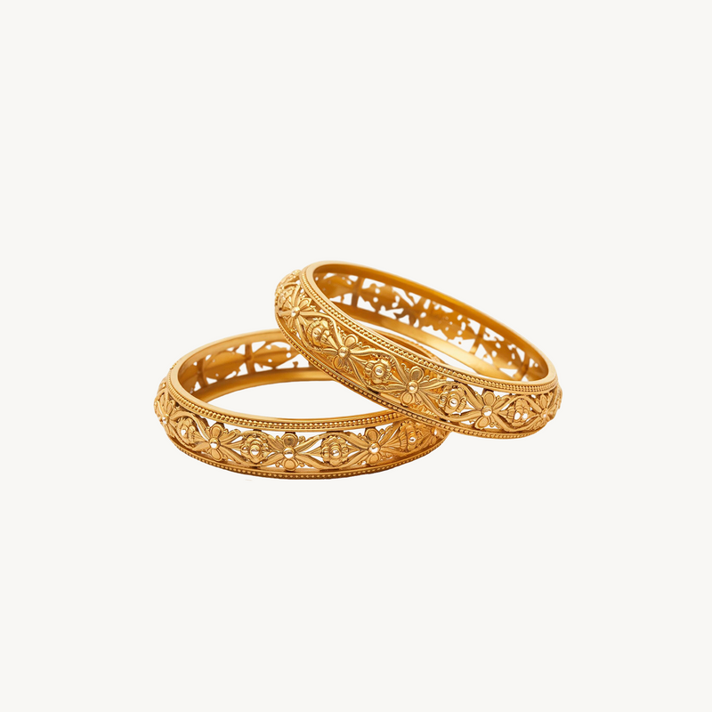 Front view of golden floral trellis bangles